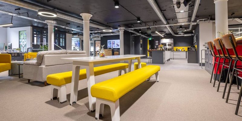 Creative Race workspace inside the former The Well pub at Joseph’s Well in Leeds, featuring modern collaborative office design.