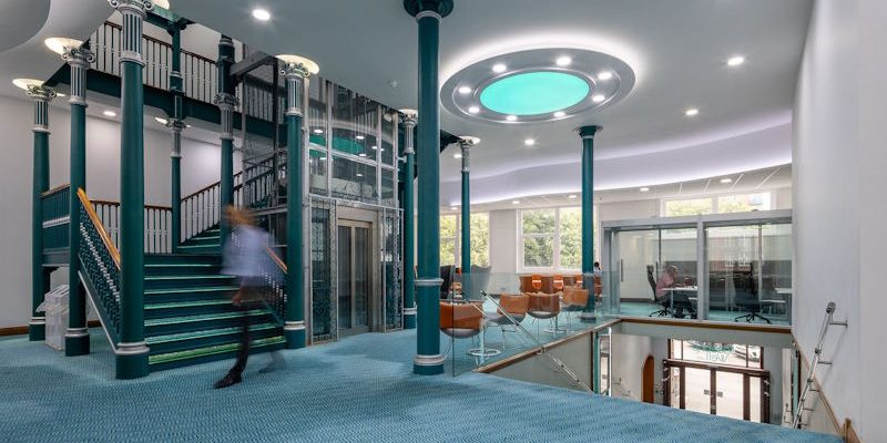 Main reception area at Joseph’s Well in Leeds featuring modern design, glass lift and spacious entrance for office tenants